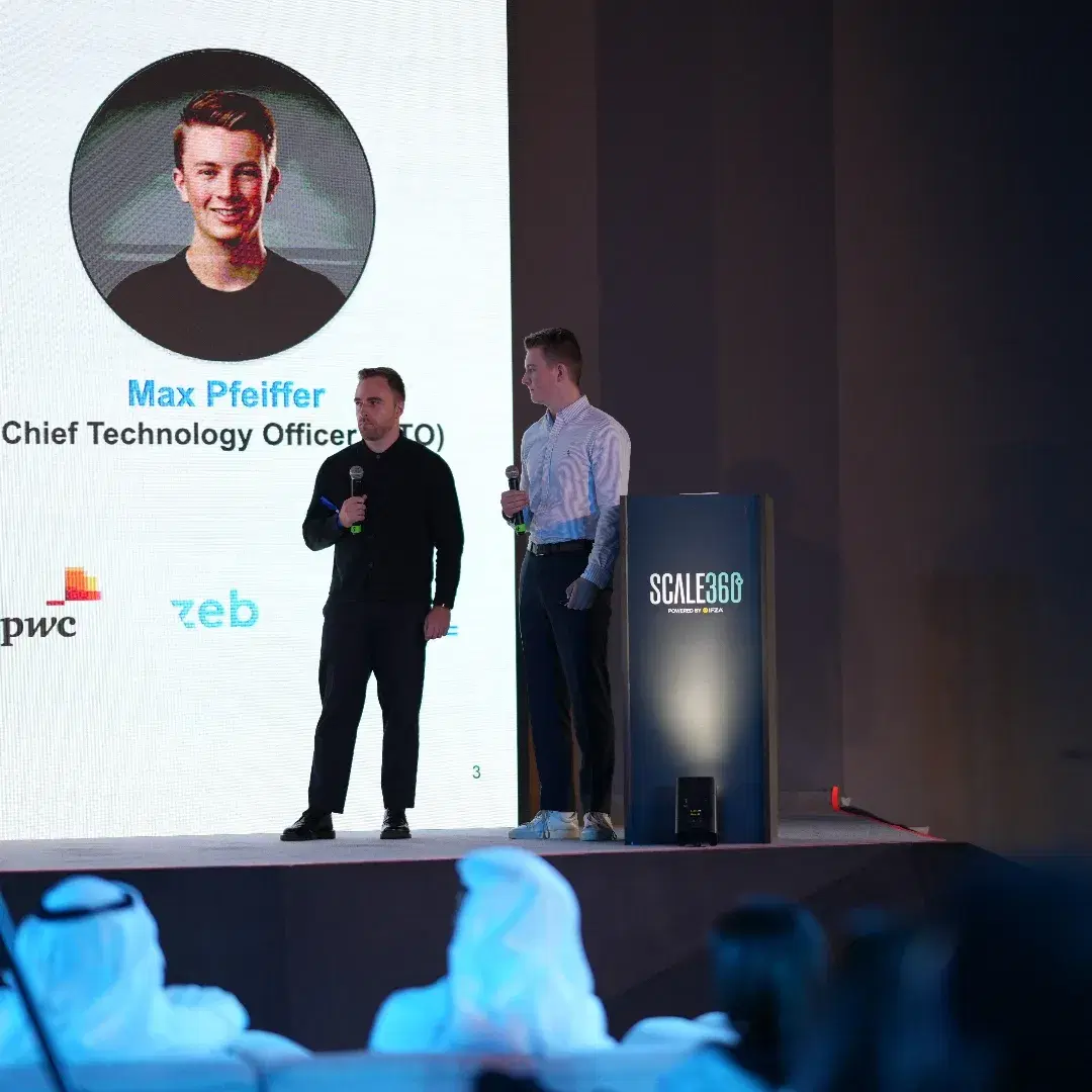 ISTINA AI team on stage receiving an award at a startup competition